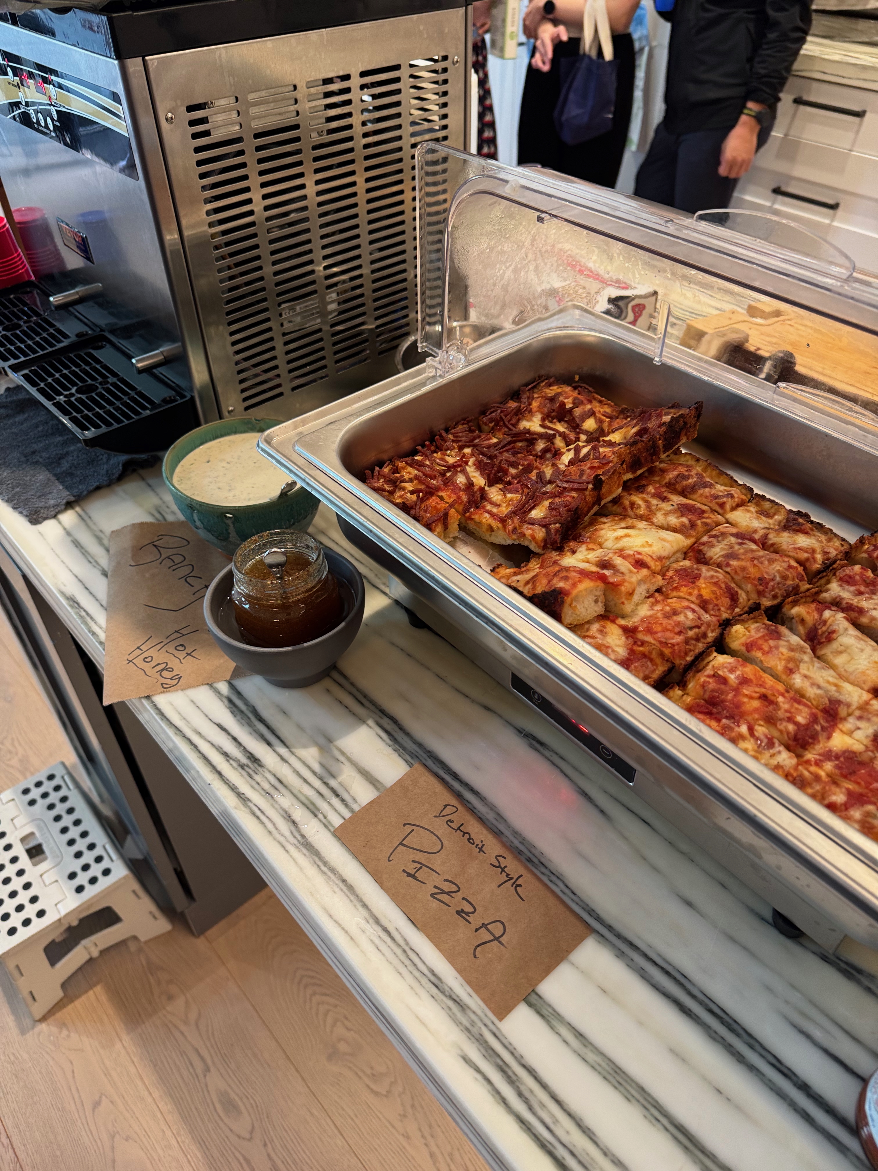 Detroit-style pizza at a private boil